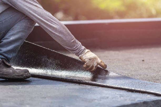 Professional Waterproofing technician working in Seaford, NY
